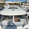 Bateau moteur occasion Quicksilver weekend 700 vue babord scaled