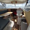 Bateau moteur occasion Quicksilver weekend 700 vue interieure scaled