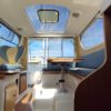 Bateau moteur occasion Quicksilver weekend 700 vue interieure 3 scaled